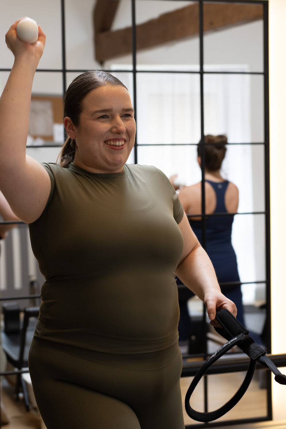 A smiling client at EVOLVE